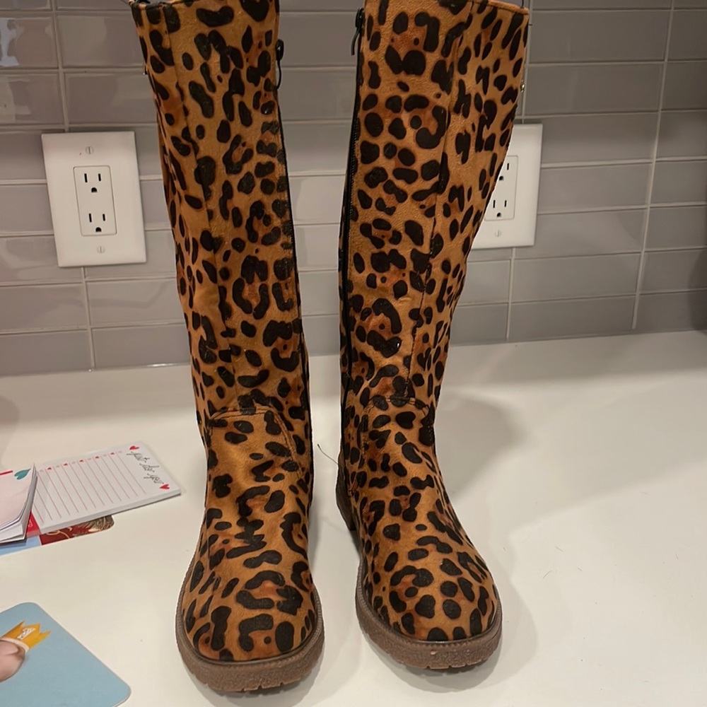 Never worn cheetah suede boots. Excellent condition